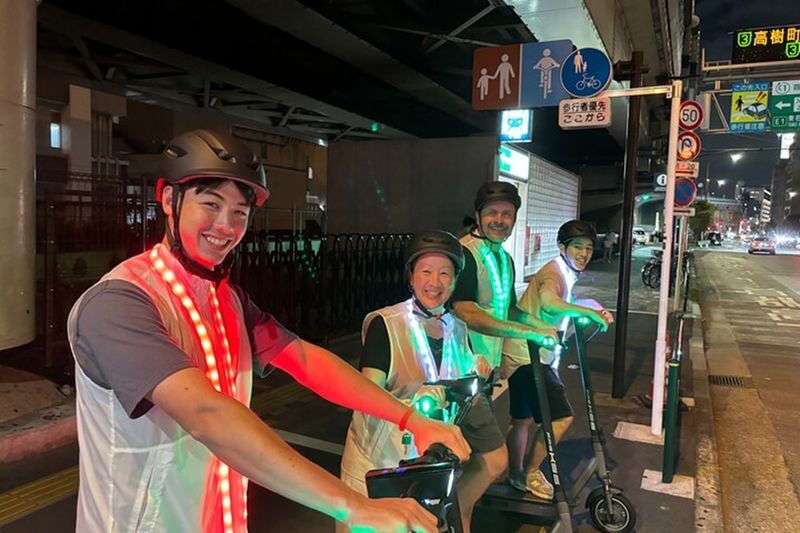 Tokyo Night E-Scooter Tour with Tokyo Tower - Booking and weather considerations