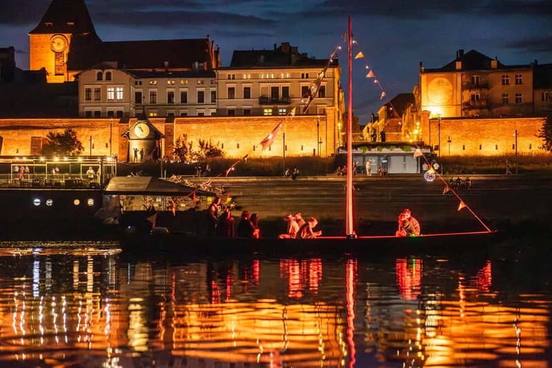 Toru: Toru at Night from a Boat on the Vistula - The Value of an Authentic Experience