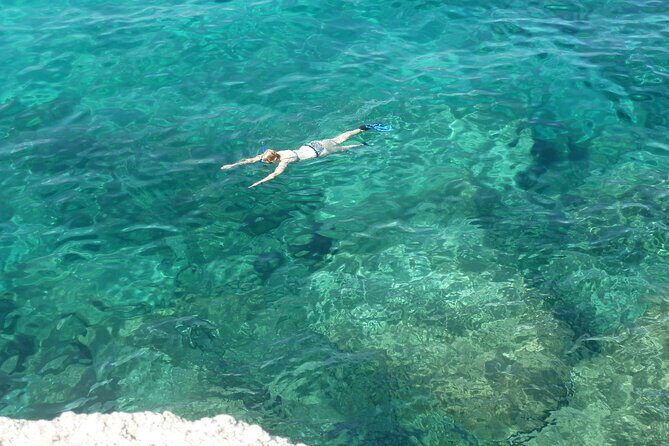 Tour in rubber dinghy and snorkeling in the Protected Marine Area of Tavolara - Experience Tavolara’s Marine Beauty on a Rubber Dinghy and Snorkeling Tour