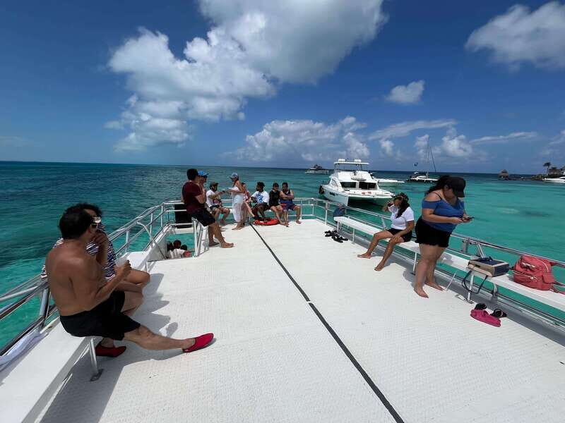 Tour Isla Mujeres: From Cancún-Riviera Maya all Included - Sunset Docks and Return Journey