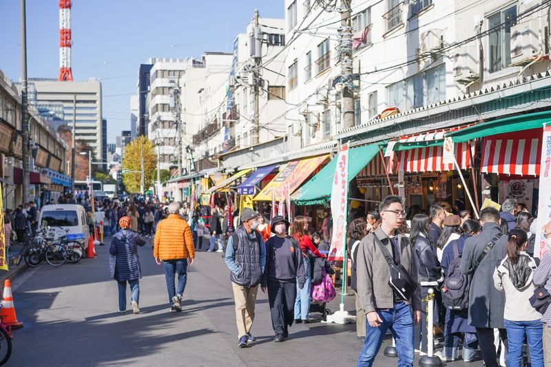 Tsukiji Fish Market Tour: Behind the Scenes & 10 Seafood Tastings - Shiodome Tower brings the route above street level