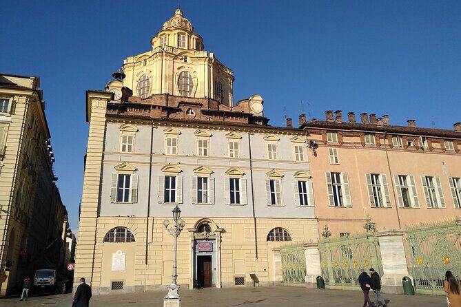 Turin Highlights Private Walking Tour with Piazza Castello and Piazza San Carlo - Visiting the Basilica and Cathedral of John the Baptist
