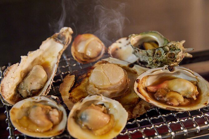 Unique Tokyo Dining Experience with Live Ama Diving - Key Points