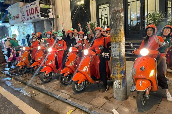 Vespa Female Ao Dai riders Night Street Food + Train Street Tour - An In-Depth Look at the Hanoi Night Vespa Tour