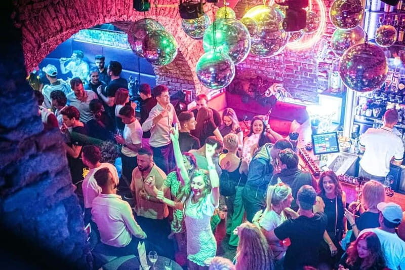 Vienna: Guided Pub Crawl with Club Entry - A Vibrant Night of Drinks, Games, and Music in Vienna