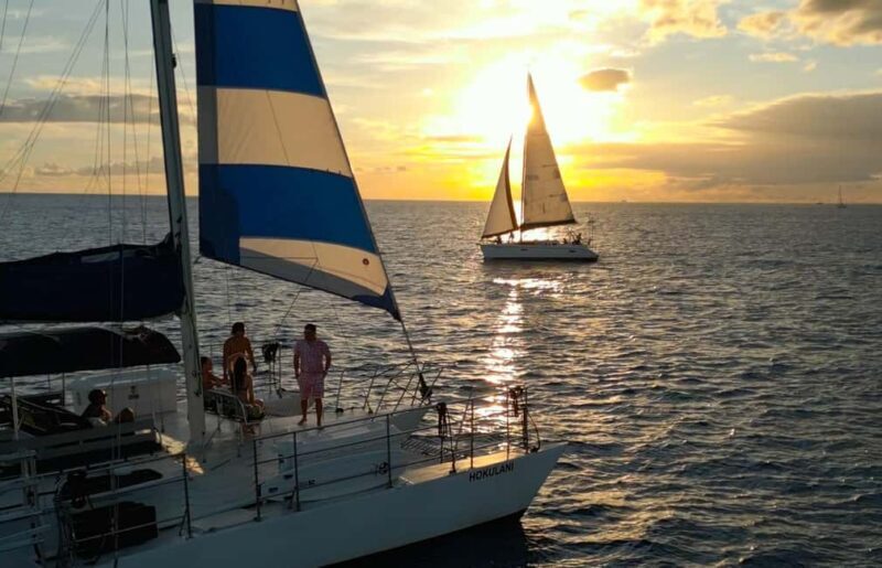 Waikiki: Sunset Swim & Sailing Experience - Waikiki: Sunset Swim & Sailing Experience – A Balancing Act of Adventure and Relaxation