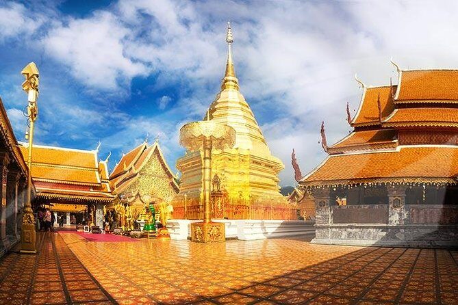 Wat Doi Suthep Temple and White Meo Hilltribe Village Half-Day Tour from Chiang Mai - Visiting Doi Suthep Pui National Park and the Hilltribe