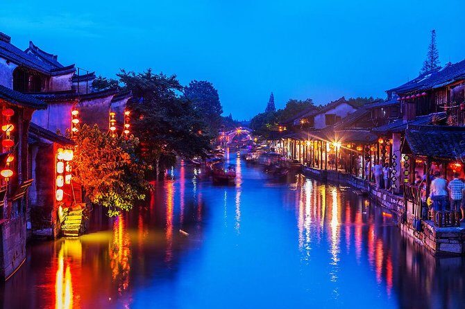 Xitang Water Village Sunset Tour with Riverside Dining Experience from Shanghai - Experience the Tranquility of Xitang Water Village at Sunset